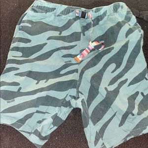 Green zebra striped patterned shorts
